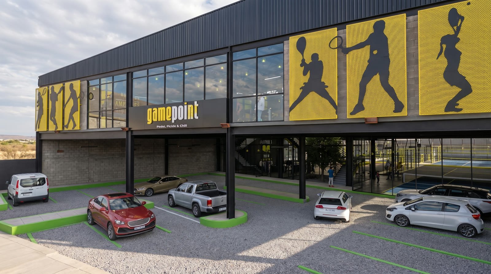 GamePoint — vista en ángulo de la fachada y el acceso bajo la marquesina, Juriquilla Querétaro